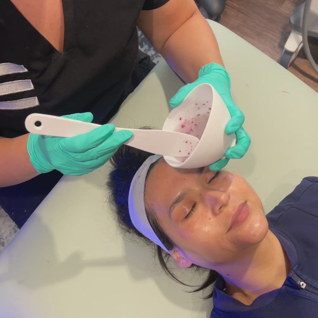 woman getting egyptian rose hydro jelly mask facial