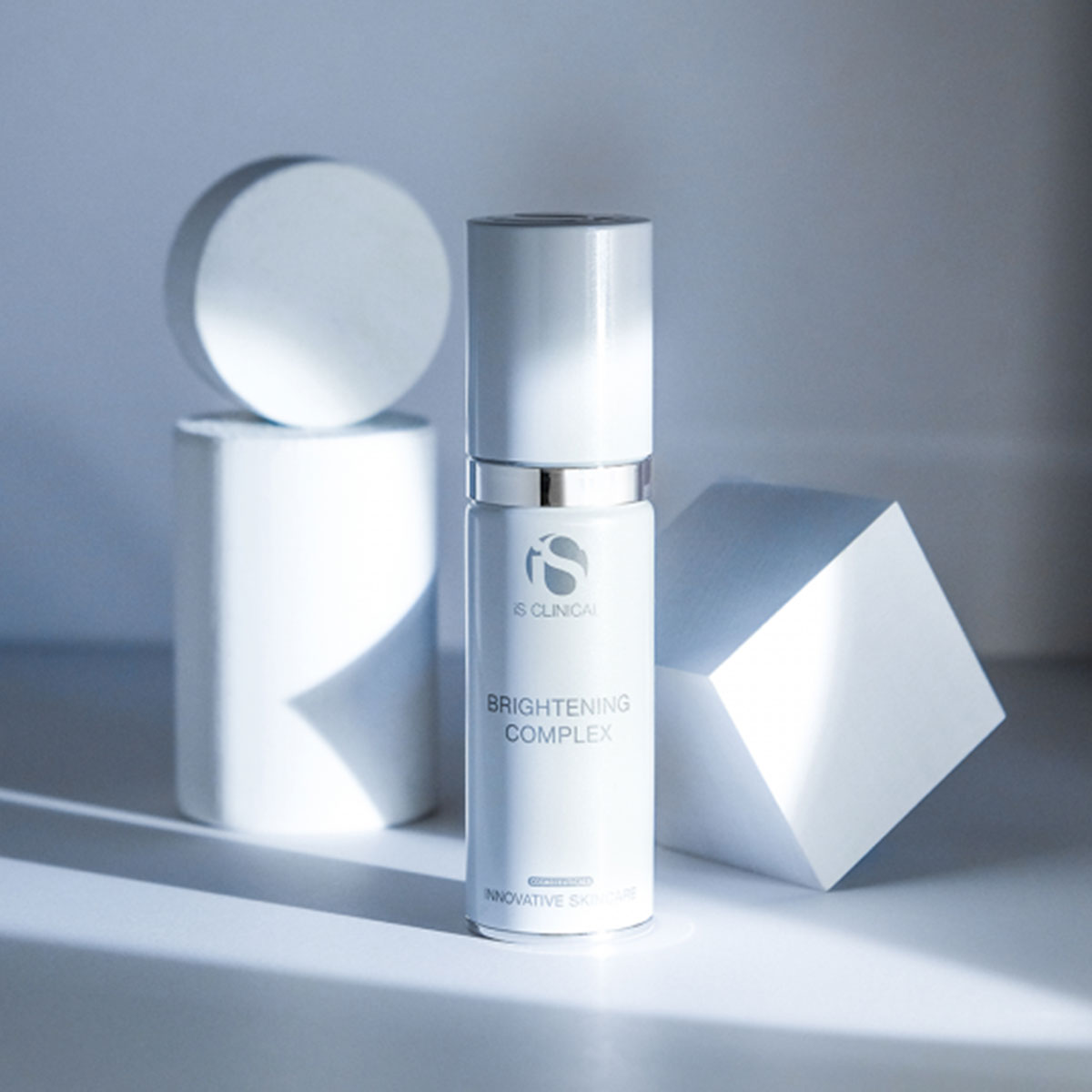 bottle of brightening complex by is clinical skincare botanicals
